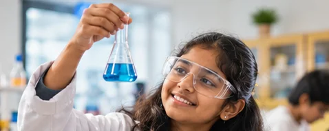 Student with a science flask